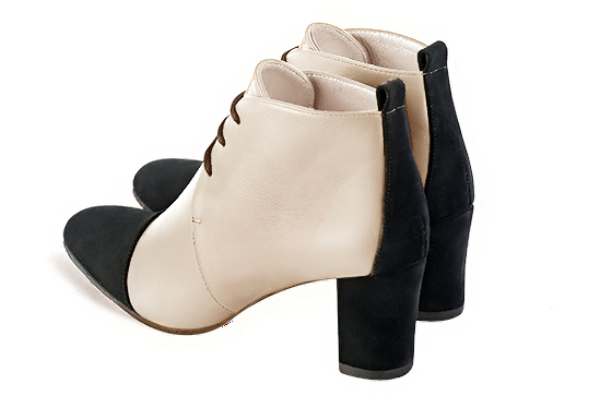 Champagne white and matt black women's ankle boots with laces at the front. Round toe. Medium block heels. Rear view - Florence KOOIJMAN